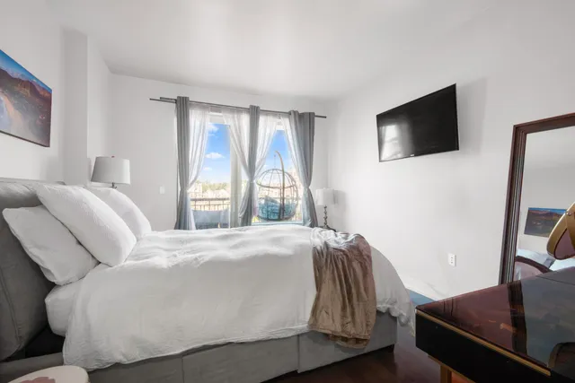 a view of entryway with wooden floor