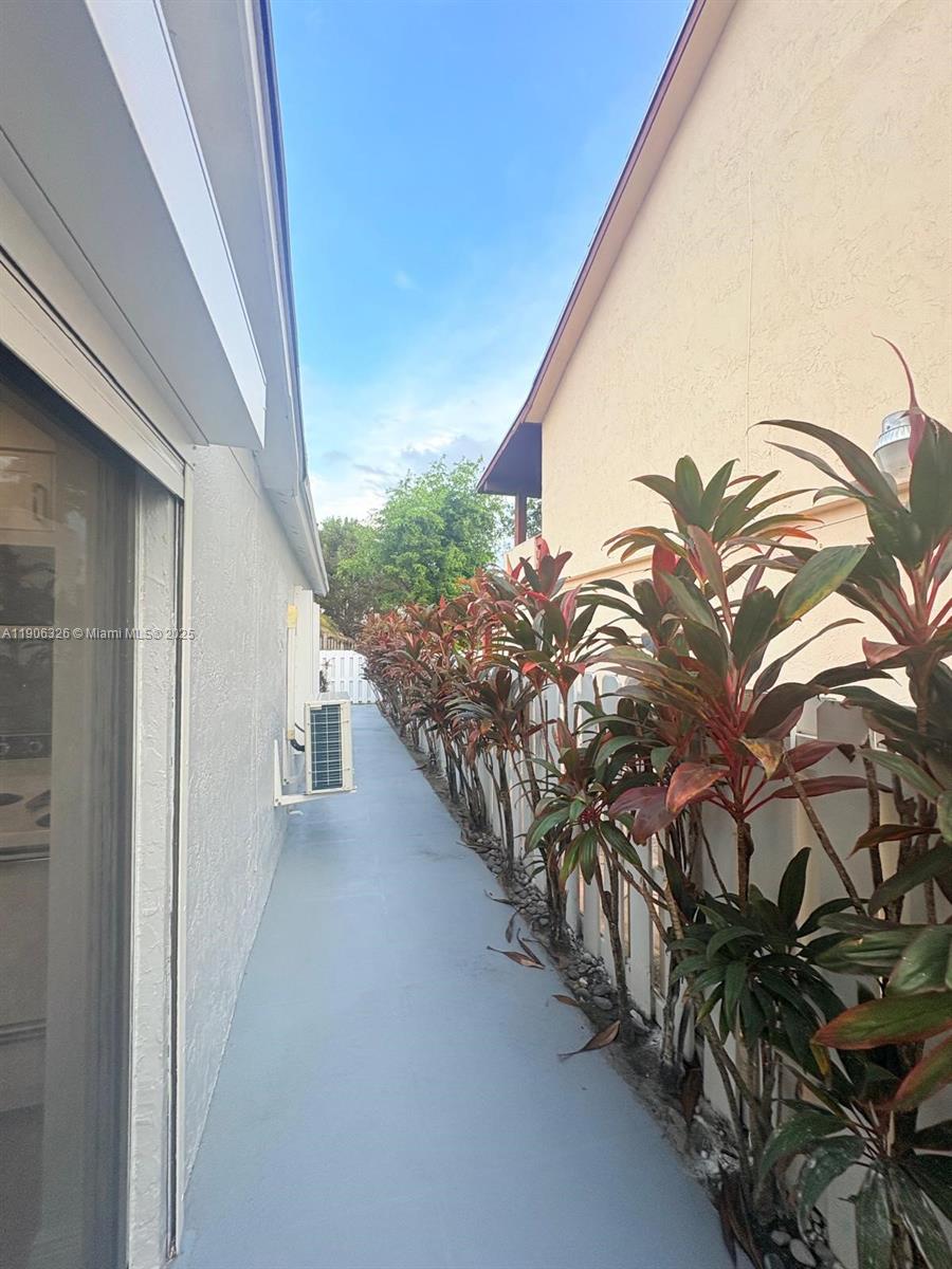 927 Northwest 106th Ave Circle Miami, FL 33172 - Photo 23 of 24 a view of a house with balcony