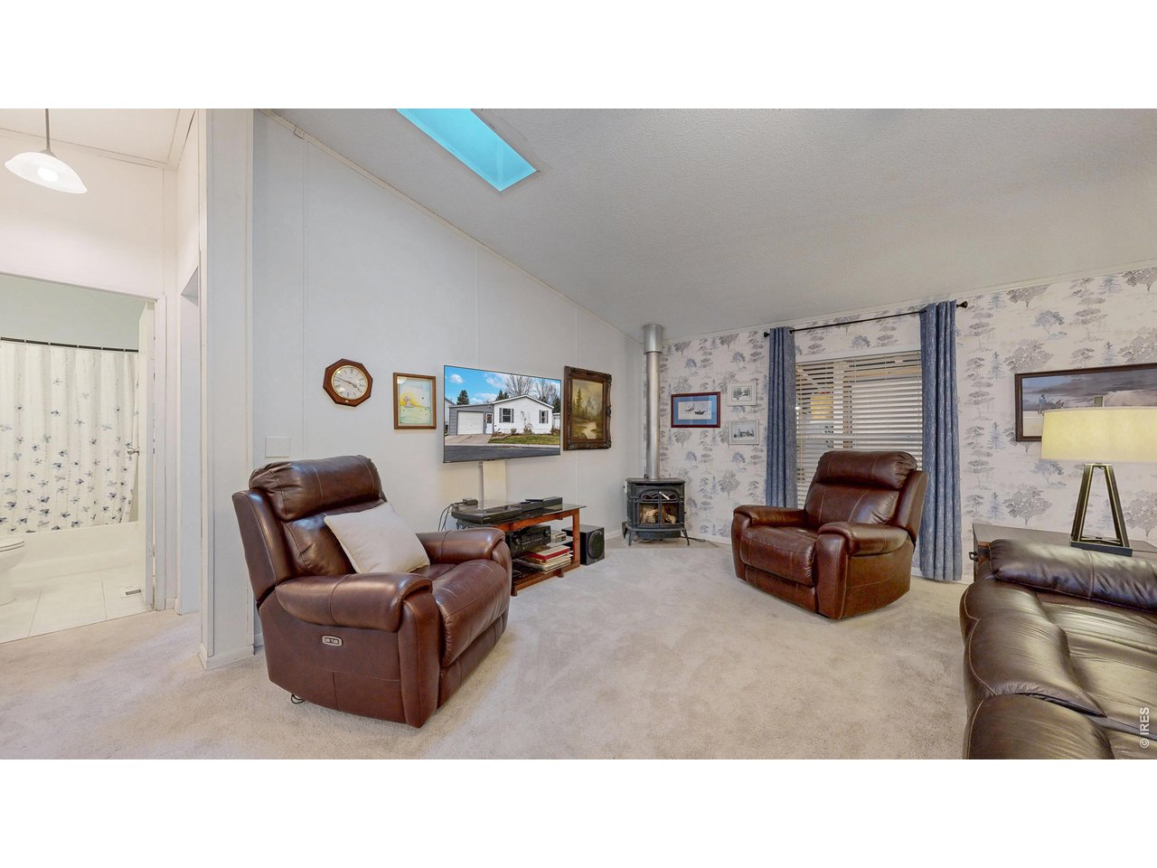 1663 Jade Drive, Unit 151 Loveland, CO 80537 - Photo 4 of 13 Cozy up next to the fireplace