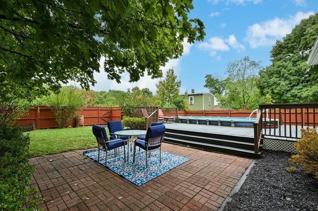 20 Butler Street Medford, MA 02155 - Photo 28 of 29 a view of a bench in the backyard