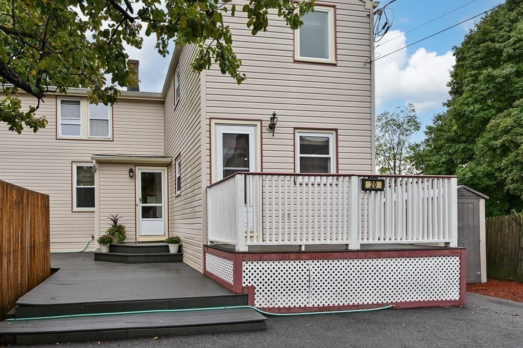 20 Butler Street Medford, MA 02155 - Photo 3 of 29 a view of a house with a wooden fence