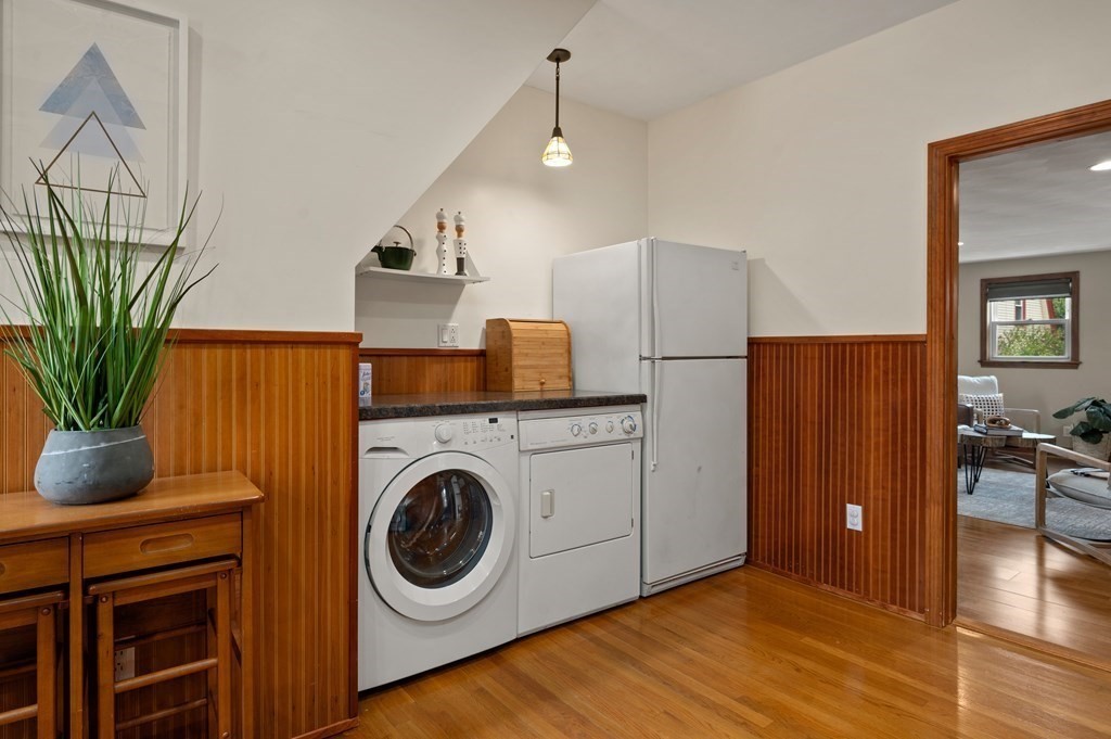 20 Butler Street Medford, MA 02155 - Photo 7 of 29 a view of a hallway with washer and dryer