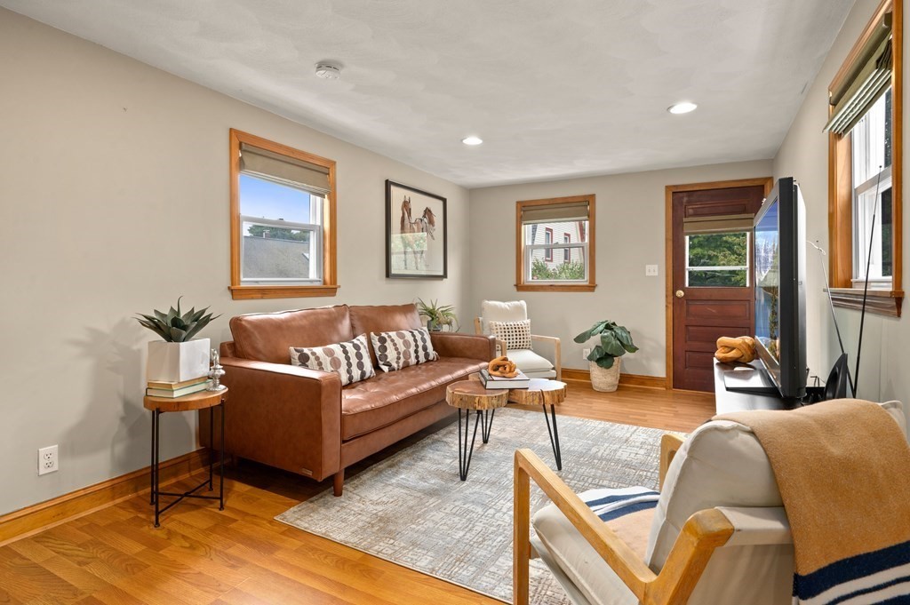 20 Butler Street Medford, MA 02155 - Photo 8 of 29 a living room with furniture and a rug