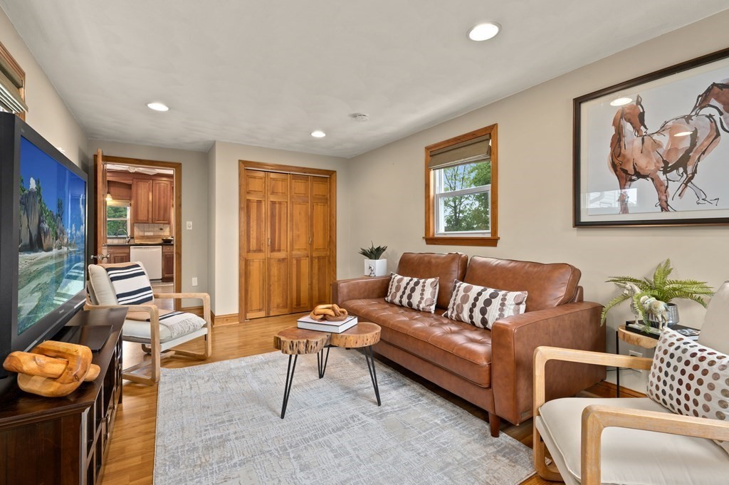 20 Butler Street Medford, MA 02155 - Photo 10 of 29 a living room with furniture and a flat screen tv
