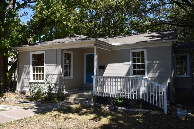 a front view of a house with a porch