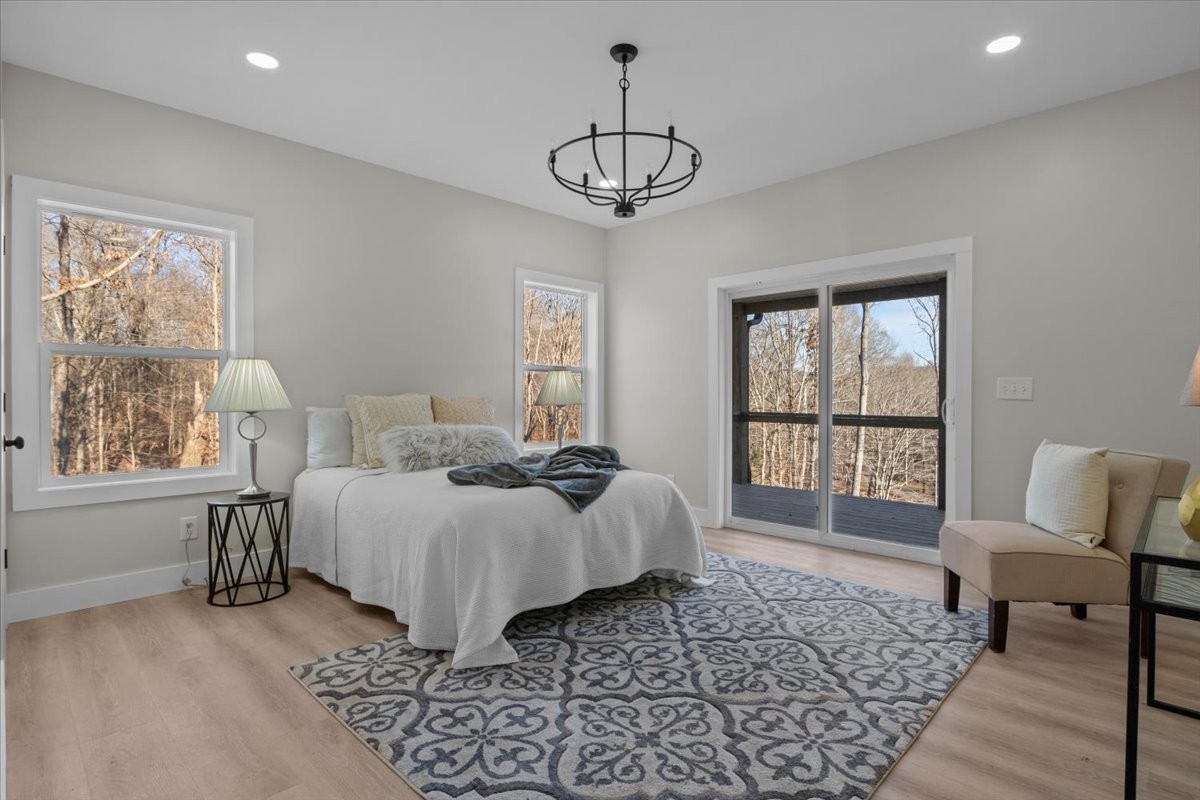 854 Little Leatherwood Road Vanleer, TN 37181 - Photo 17 of 36 a bedroom with bed and a window