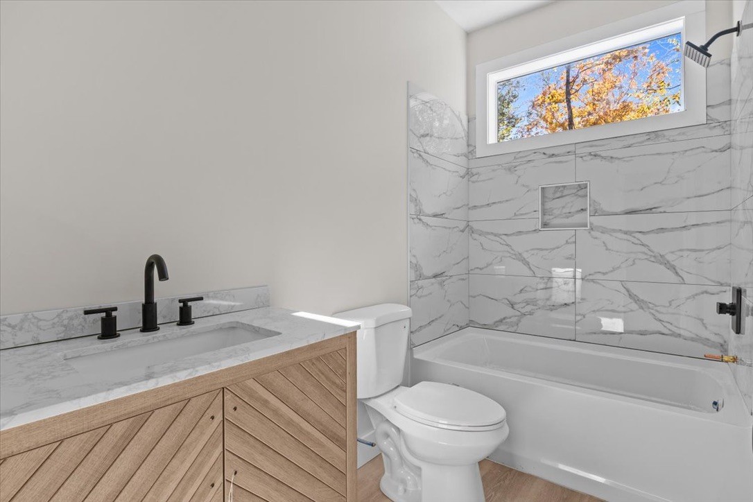 854 Little Leatherwood Road Vanleer, TN 37181 - Photo 23 of 36 a bathroom with a sink and a toilet