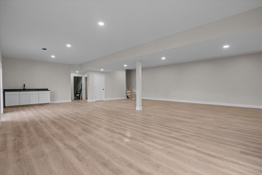 854 Little Leatherwood Road Vanleer, TN 37181 - Photo 29 of 36 a view of a kitchen with a sink and a refrigerator