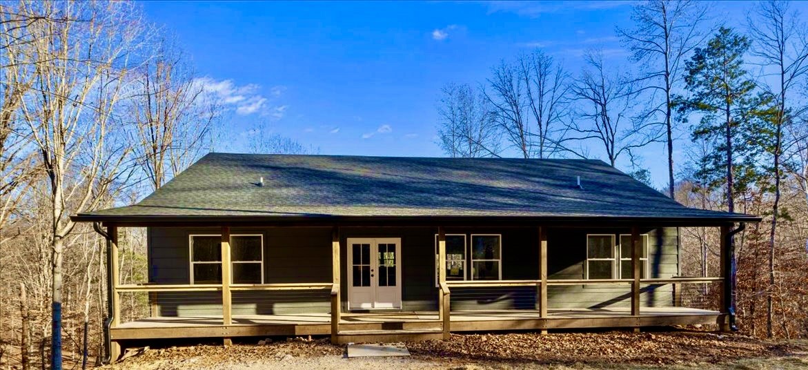 854 Little Leatherwood Road Vanleer, TN 37181 - Photo 36 of 36 a view of a house with a yard