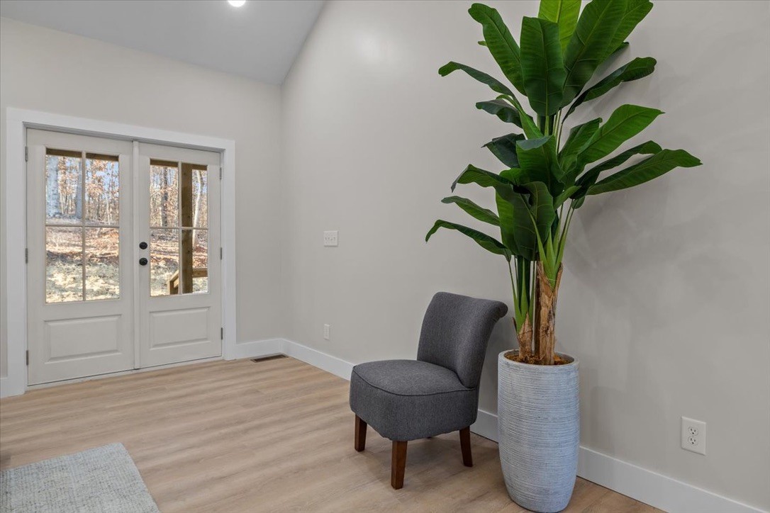 854 Little Leatherwood Road Vanleer, TN 37181 - Photo 8 of 36 a living room with furniture and a potted plant