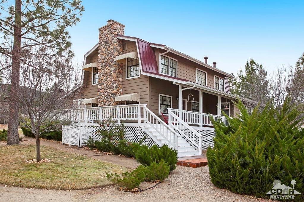 60189 Devils Ladder Road Mountain Center, CA 92561 - Photo 2 of 25 a front view of a house with garden