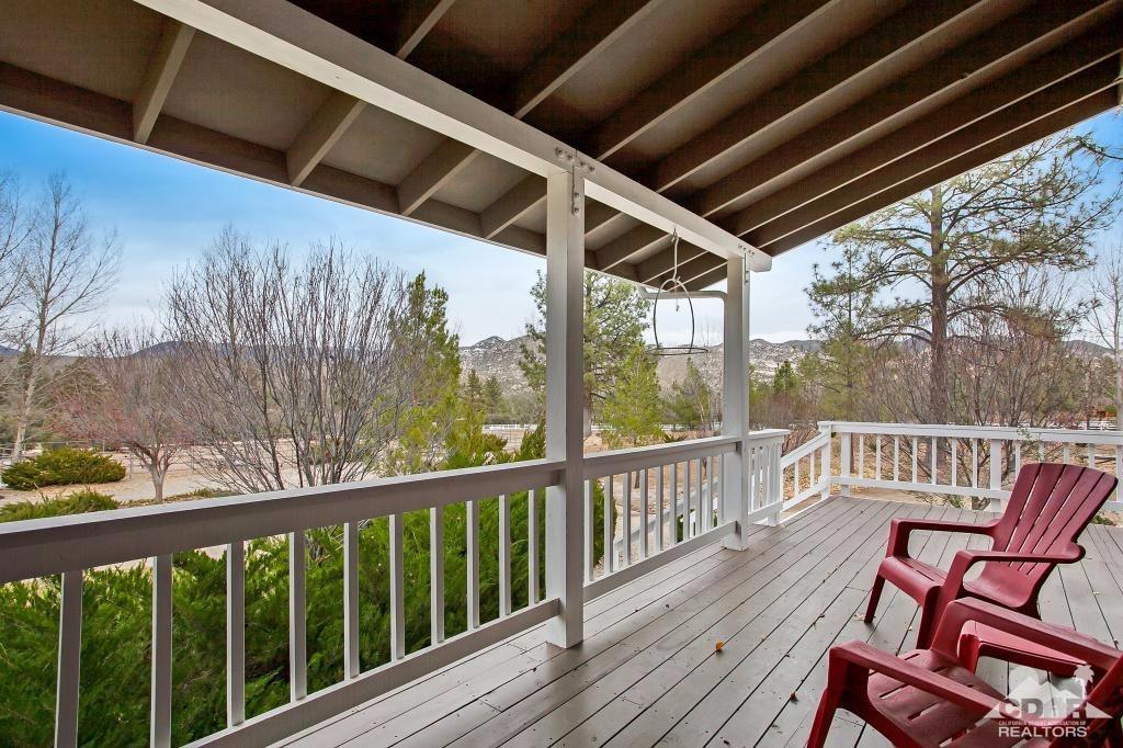 60189 Devils Ladder Road Mountain Center, CA 92561 - Photo 14 of 25 a view of a two chairs in the balcony
