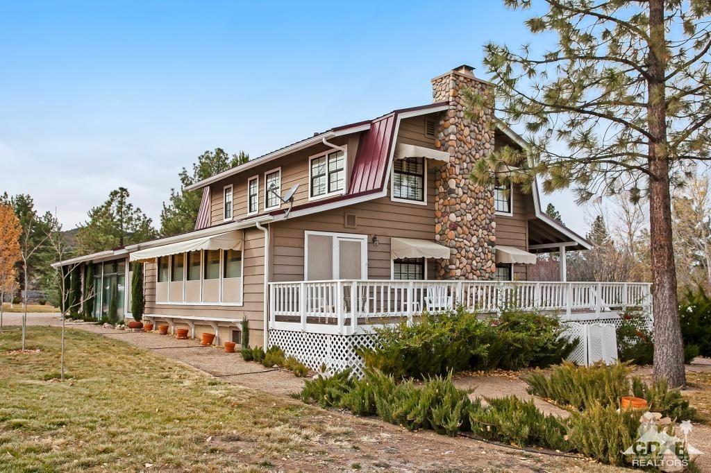60189 Devils Ladder Road Mountain Center, CA 92561 - Photo 4 of 25 front view of a house with a small yard