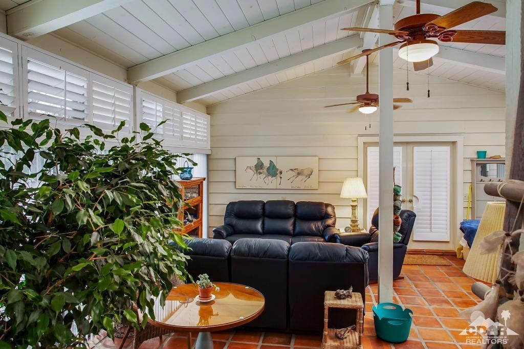 60189 Devils Ladder Road Mountain Center, CA 92561 - Photo 6 of 25 a living room with furniture and a potted plant