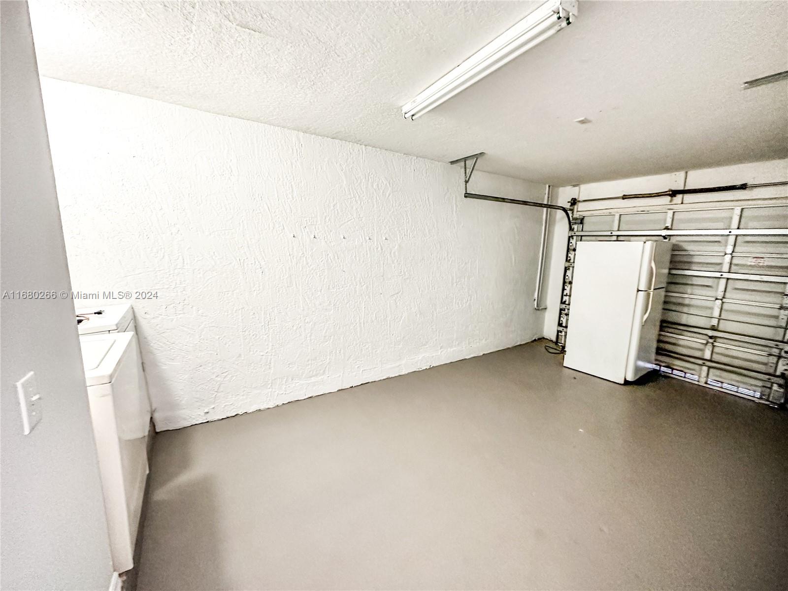 13970 Southwest 260th Street, Unit 105 Homestead, FL 33032 - Photo 5 of 31 a view of a room with closet