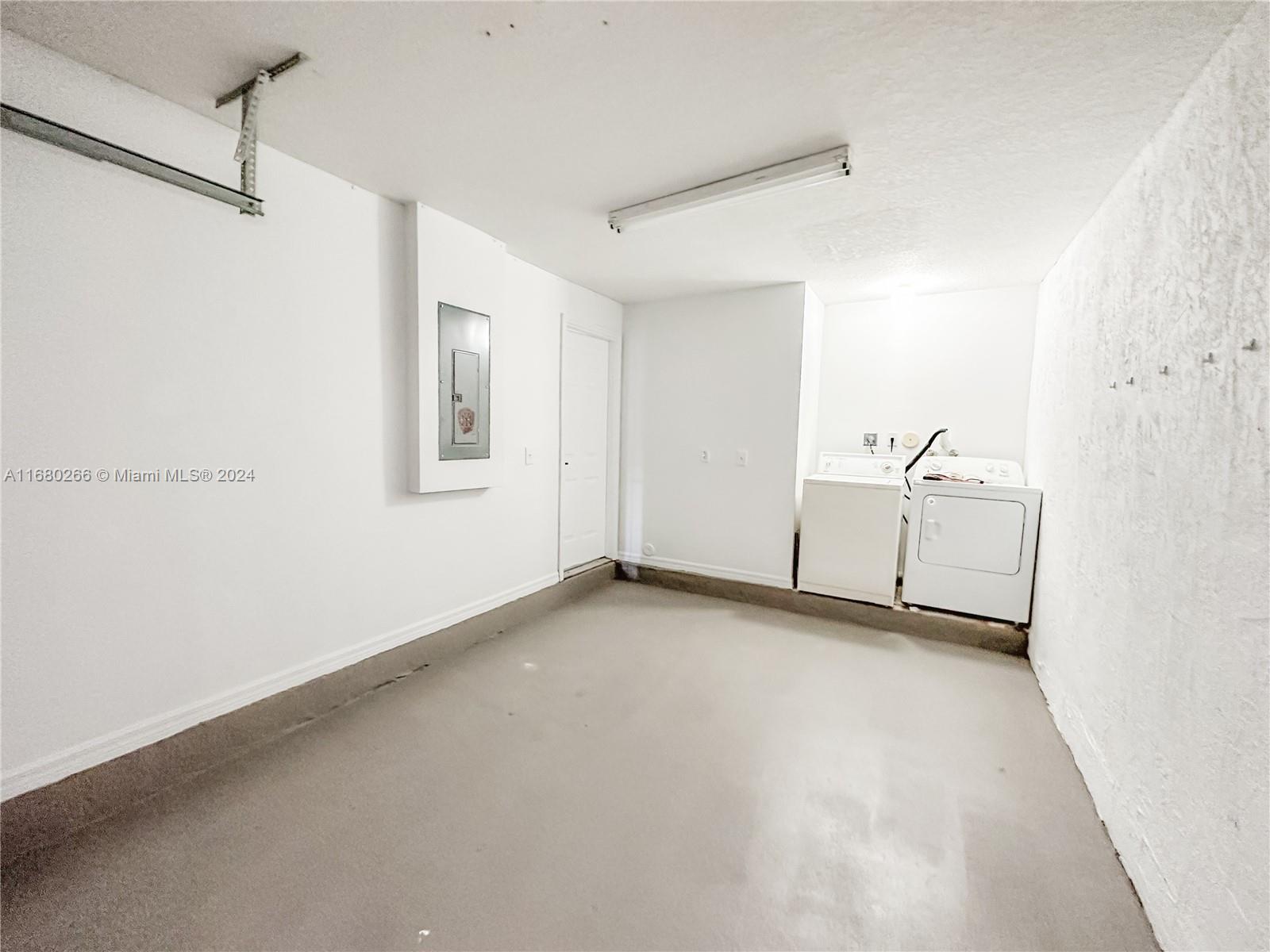 13970 Southwest 260th Street, Unit 105 Homestead, FL 33032 - Photo 6 of 31 a view of an empty room