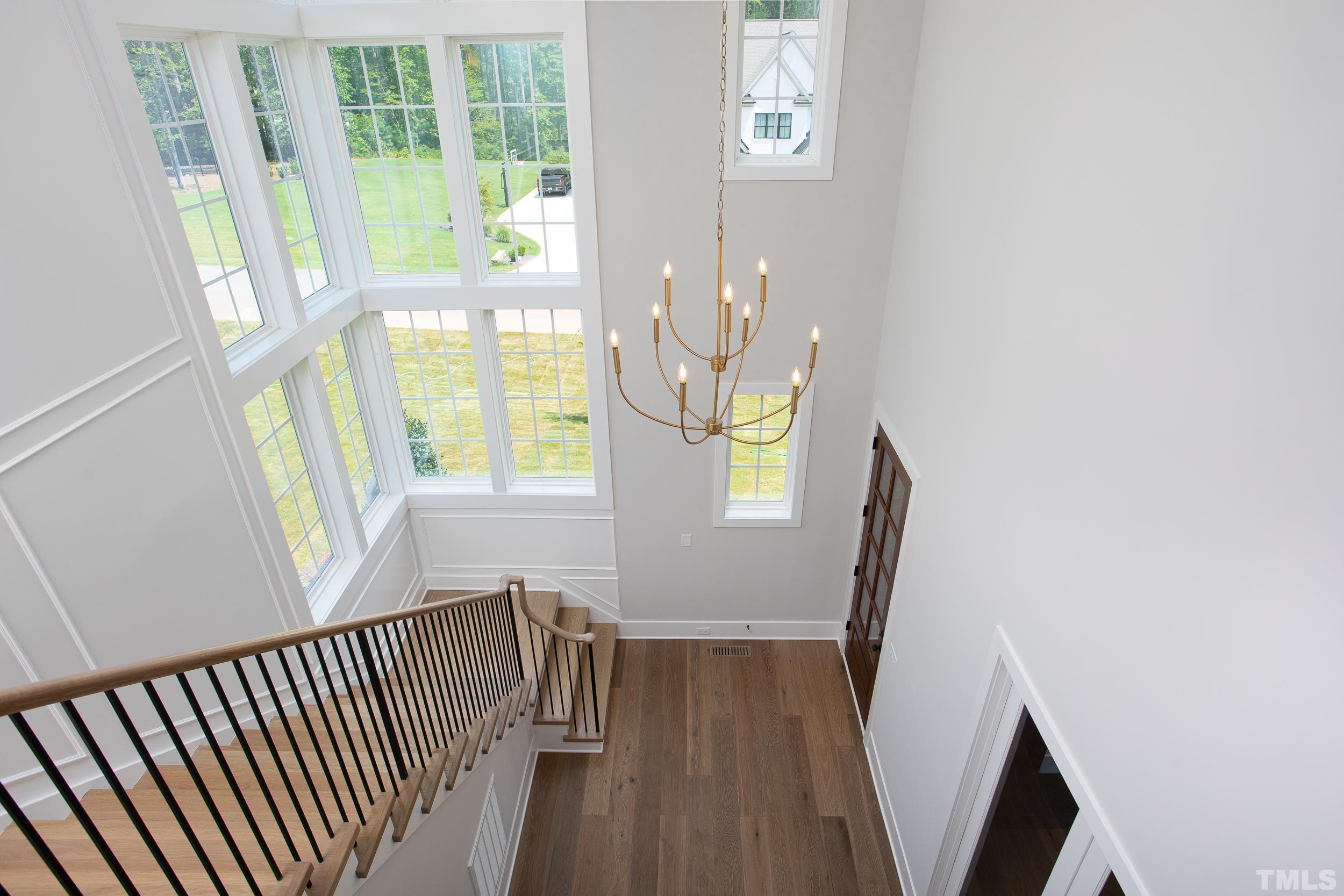 1501 Starry Night Court Raleigh, NC 27613 - Photo 42 of 47 a view of wooden floor and windows