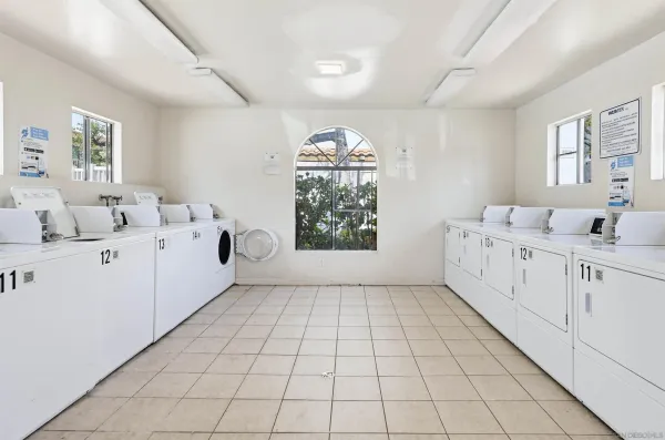a very nice looking room with white walls and white walls