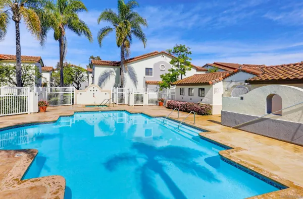 a view of a house with swimming pool