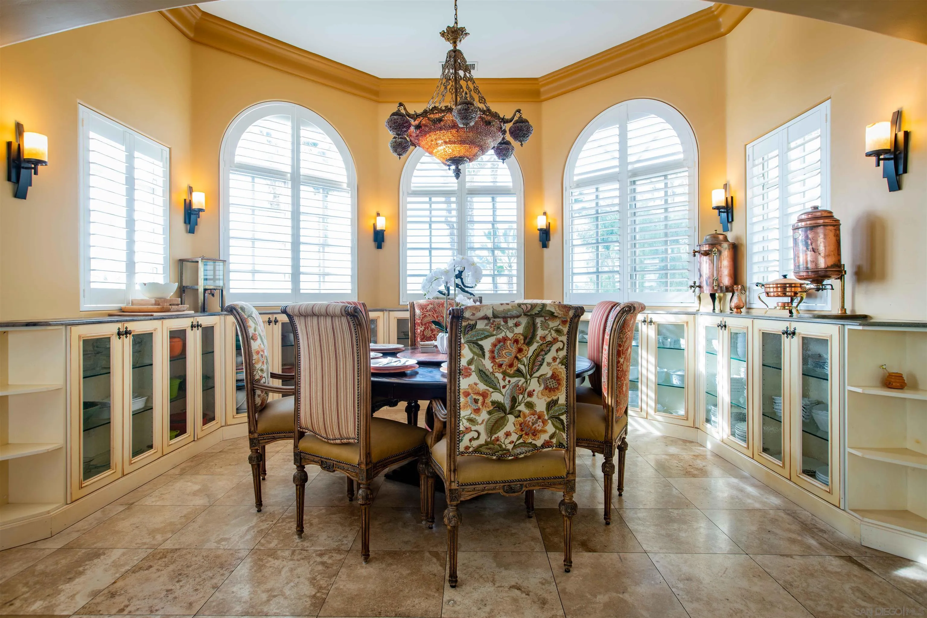 17676 Vista Rancho Court Rancho Santa Fe, CA 92091 - Photo 15 of 71 a view of a dining room with furniture and a window