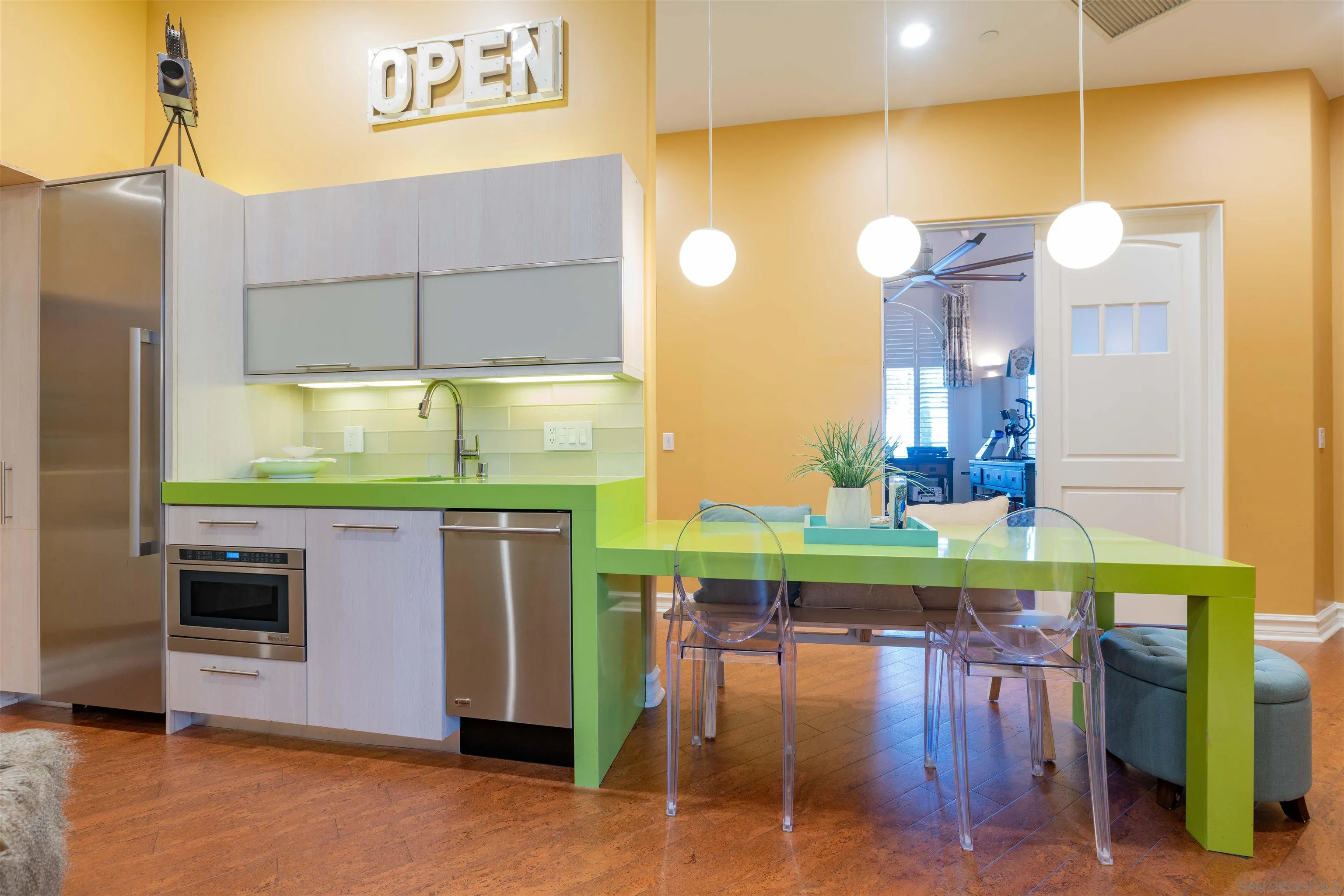 17676 Vista Rancho Court Rancho Santa Fe, CA 92091 - Photo 41 of 71 a kitchen with stainless steel appliances wooden floor and window