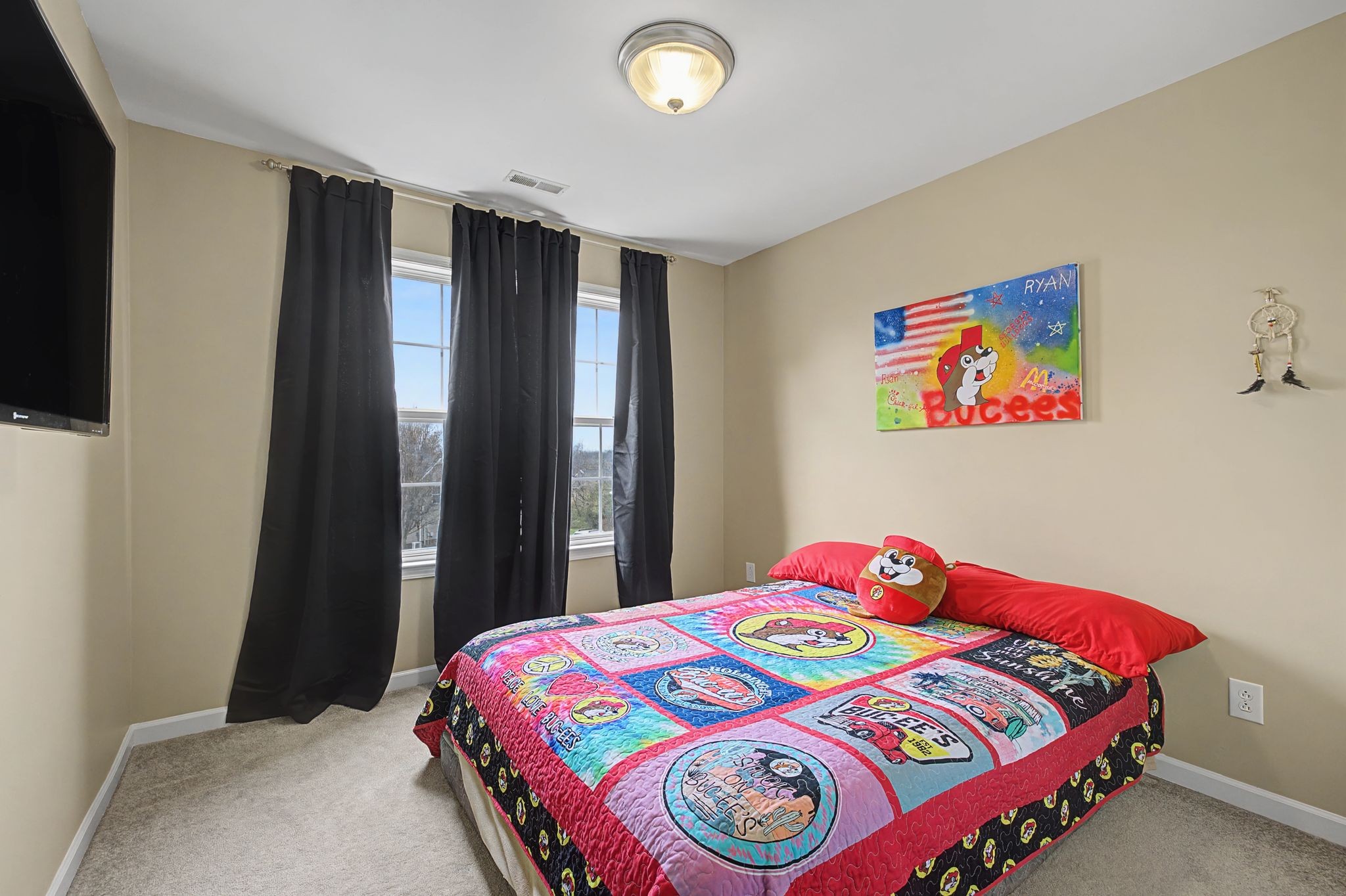 4012 Farmville Court Spring Hill, TN 37174 - Photo 26 of 29 a bedroom with a bed and a painting on the wall