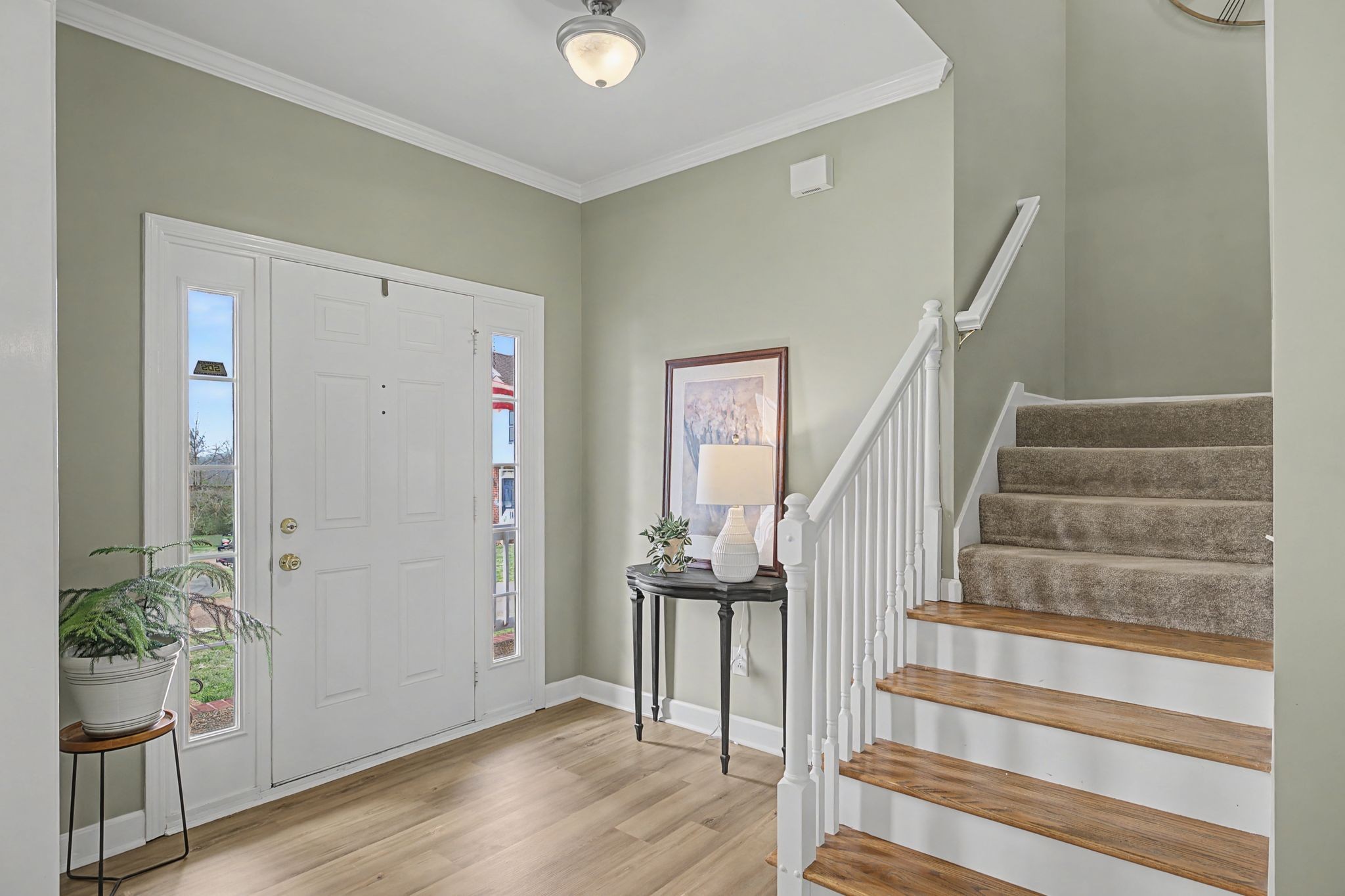 4012 Farmville Court Spring Hill, TN 37174 - Photo 5 of 29 a view of entryway with wooden floor and stairs