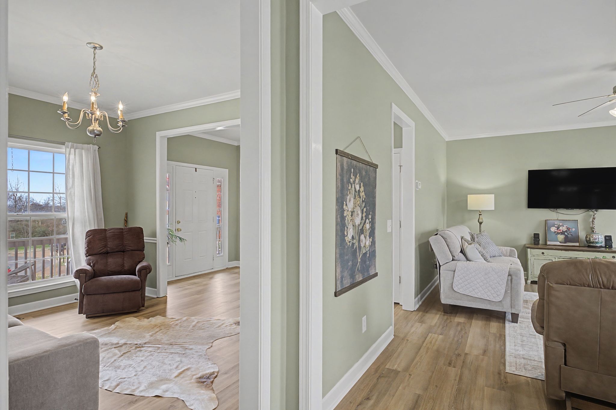 4012 Farmville Court Spring Hill, TN 37174 - Photo 7 of 29 a living room with furniture and a flat screen tv