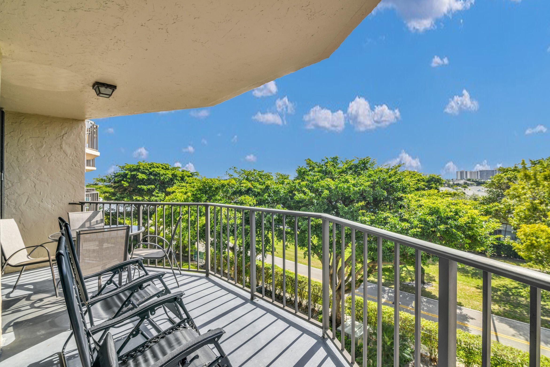 859 Jeffery Street, Unit 5090 Boca Raton, FL 33487 - Photo 26 of 55 a view of a balcony with chairs