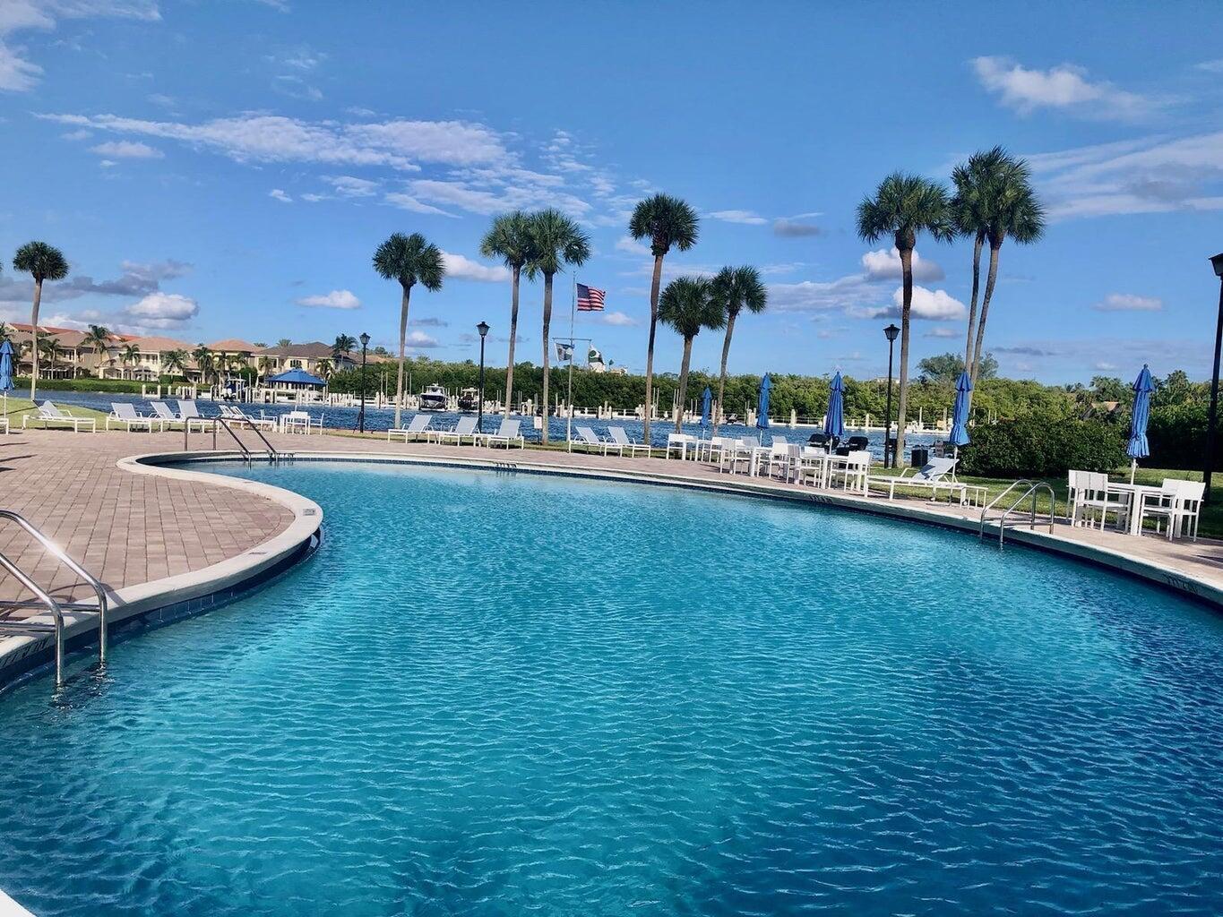 859 Jeffery Street, Unit 5090 Boca Raton, FL 33487 - Photo 39 of 55 a view of a swimming pool and a terrace