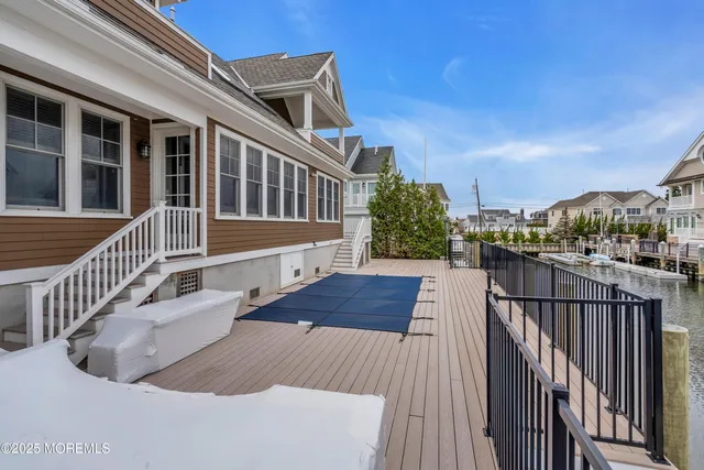 a view of a lake with a house next to a lake