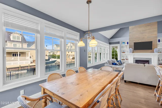 a view of a livingroom with furniture window and wooden floor