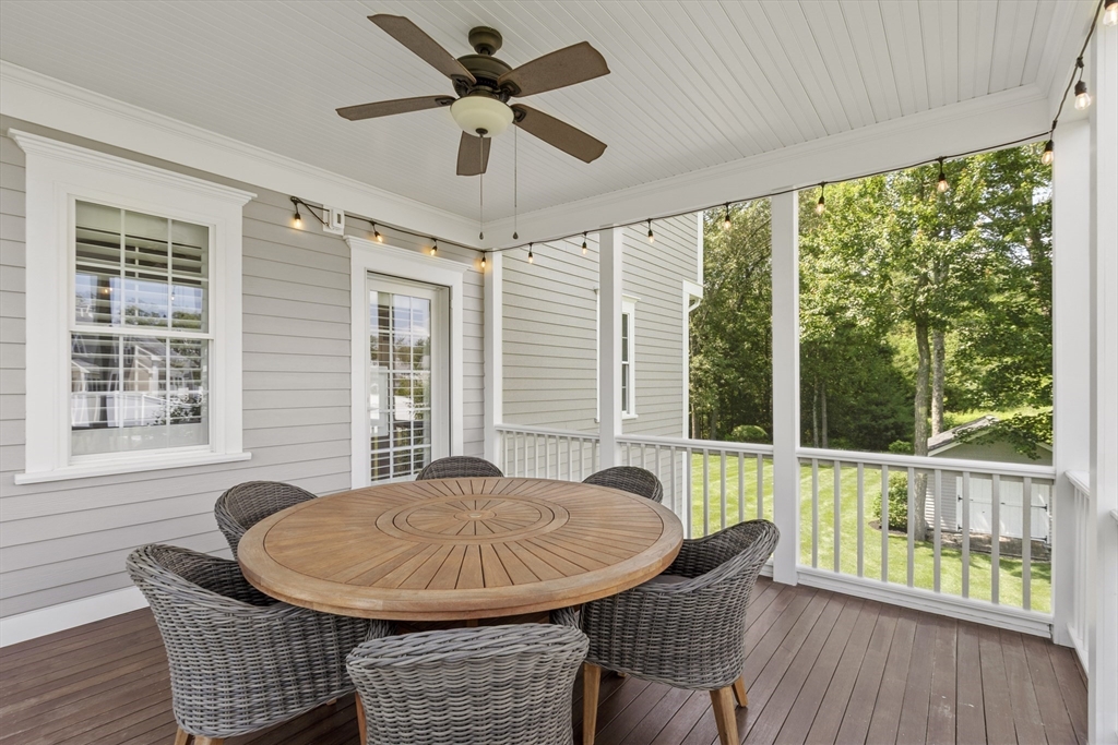 26 Mill Pond Road Bolton, MA 01740 - Photo 16 of 42 a view of a dining room with furniture window and outside view