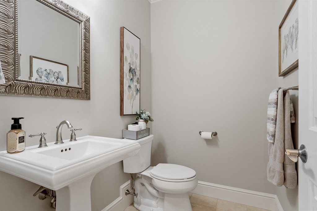 26 Mill Pond Road Bolton, MA 01740 - Photo 17 of 42 a bathroom with a sink toilet and a mirror