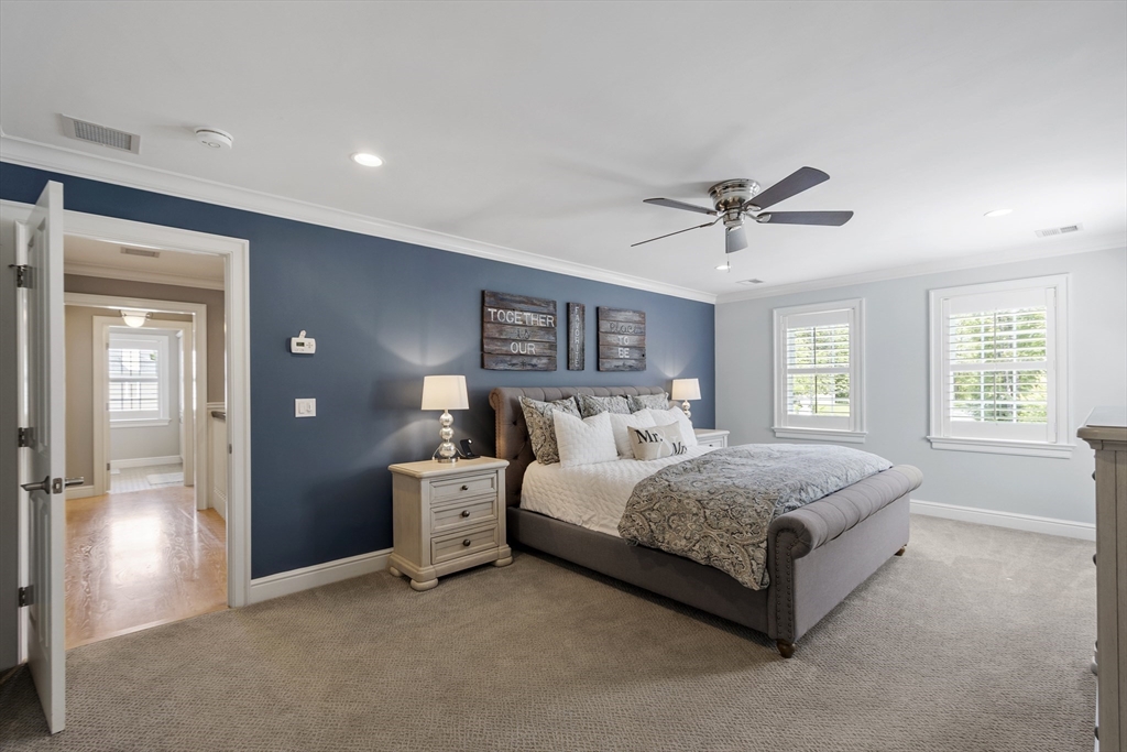 26 Mill Pond Road Bolton, MA 01740 - Photo 18 of 42 a bedroom with a bed and window