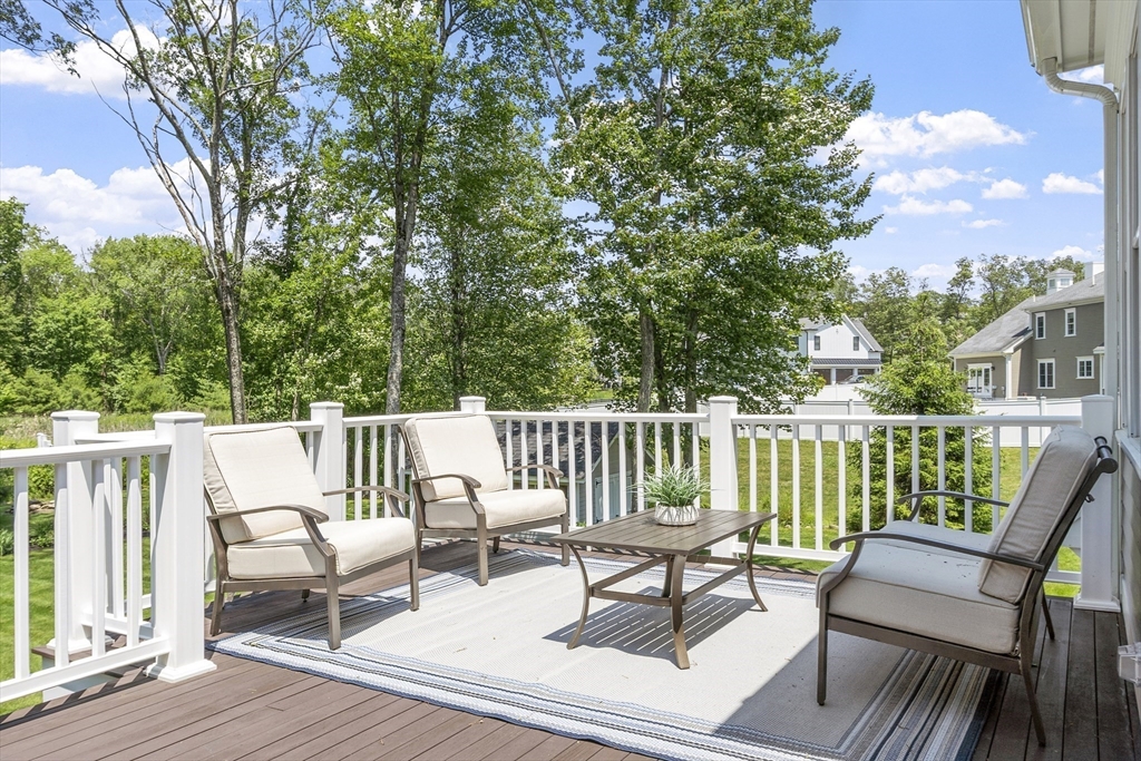 26 Mill Pond Road Bolton, MA 01740 - Photo 36 of 42 a view of balcony with furniture and wooden deck
