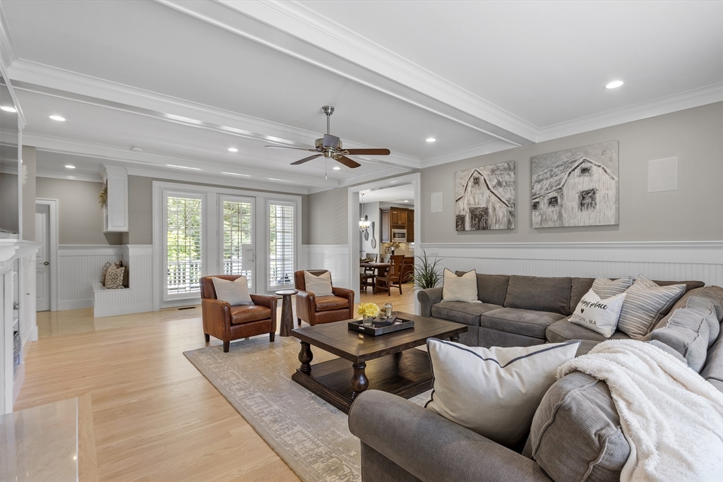26 Mill Pond Road Bolton, MA 01740 - Photo 8 of 42 a living room with furniture and large windows
