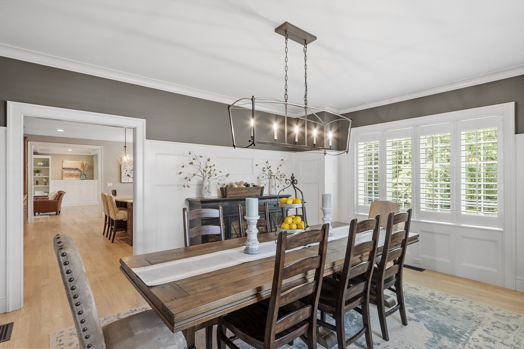 26 Mill Pond Road Bolton, MA 01740 - Photo 10 of 42 a view of a dining room with furniture window and wooden floor