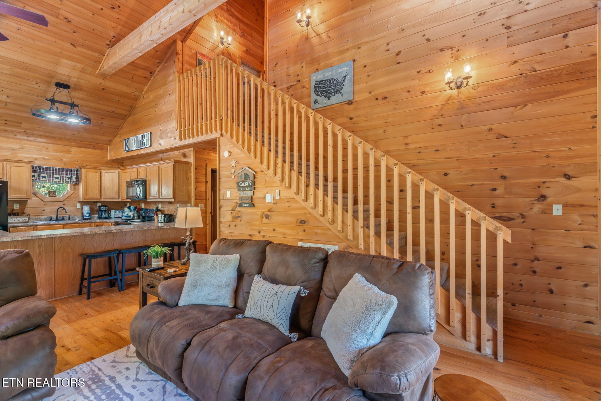 1723 Springer Road Sevierville, TN 37862 - Photo 13 of 43 a balcony with furniture and wooden floor