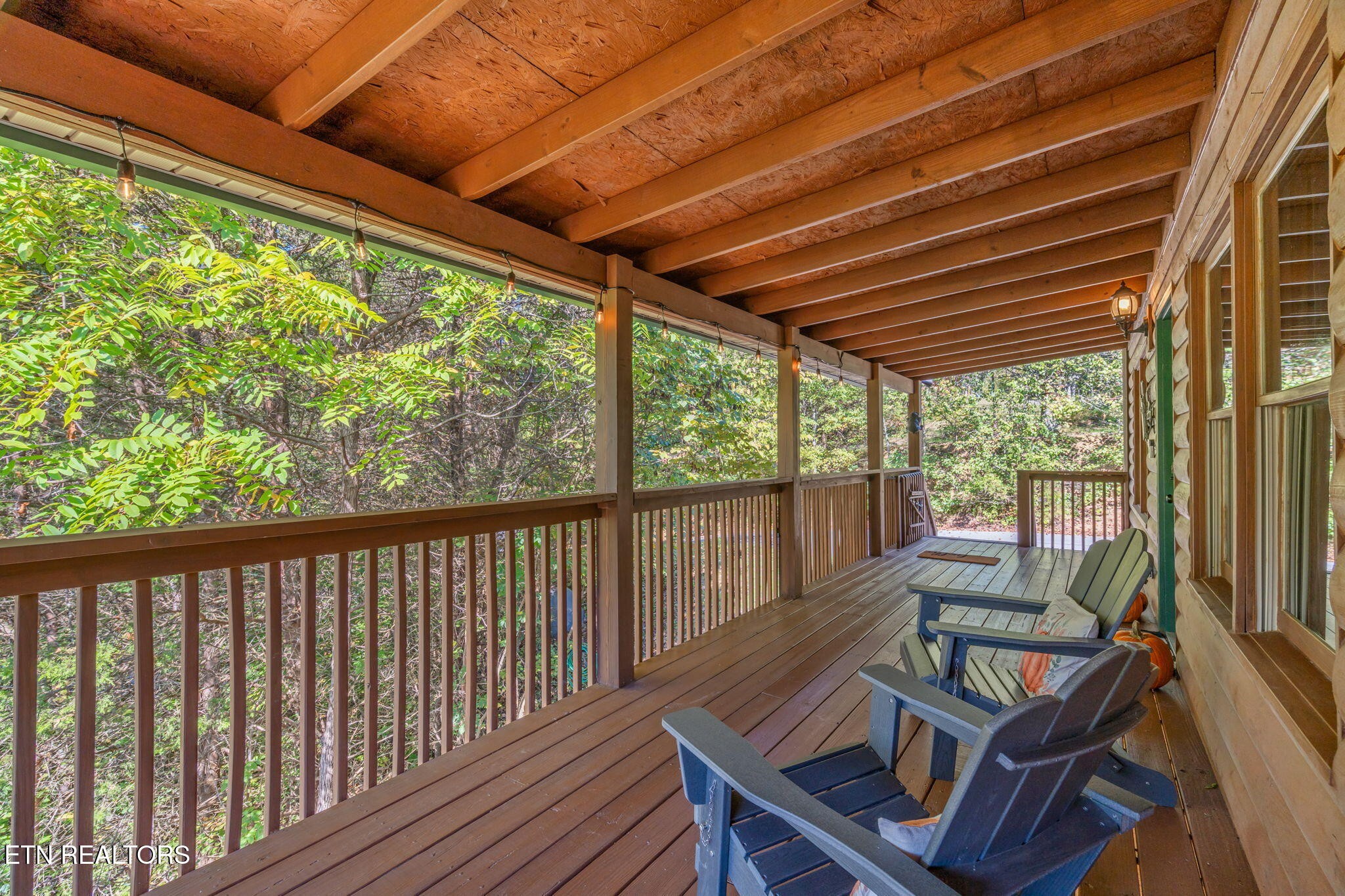 1723 Springer Road Sevierville, TN 37862 - Photo 2 of 43 a view of a two chairs in the balcony