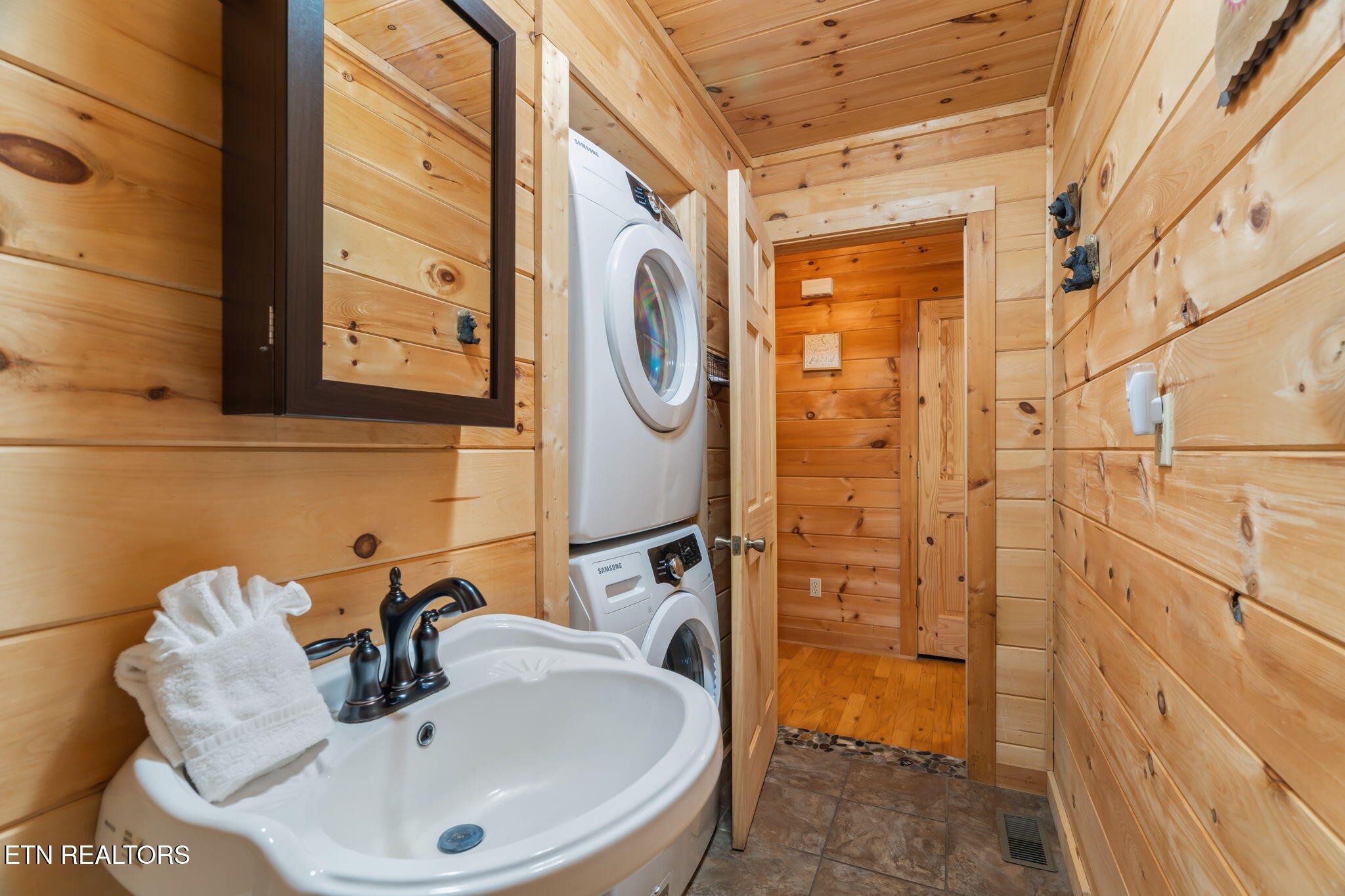 1723 Springer Road Sevierville, TN 37862 - Photo 26 of 43 a bathroom with a sink and a mirror
