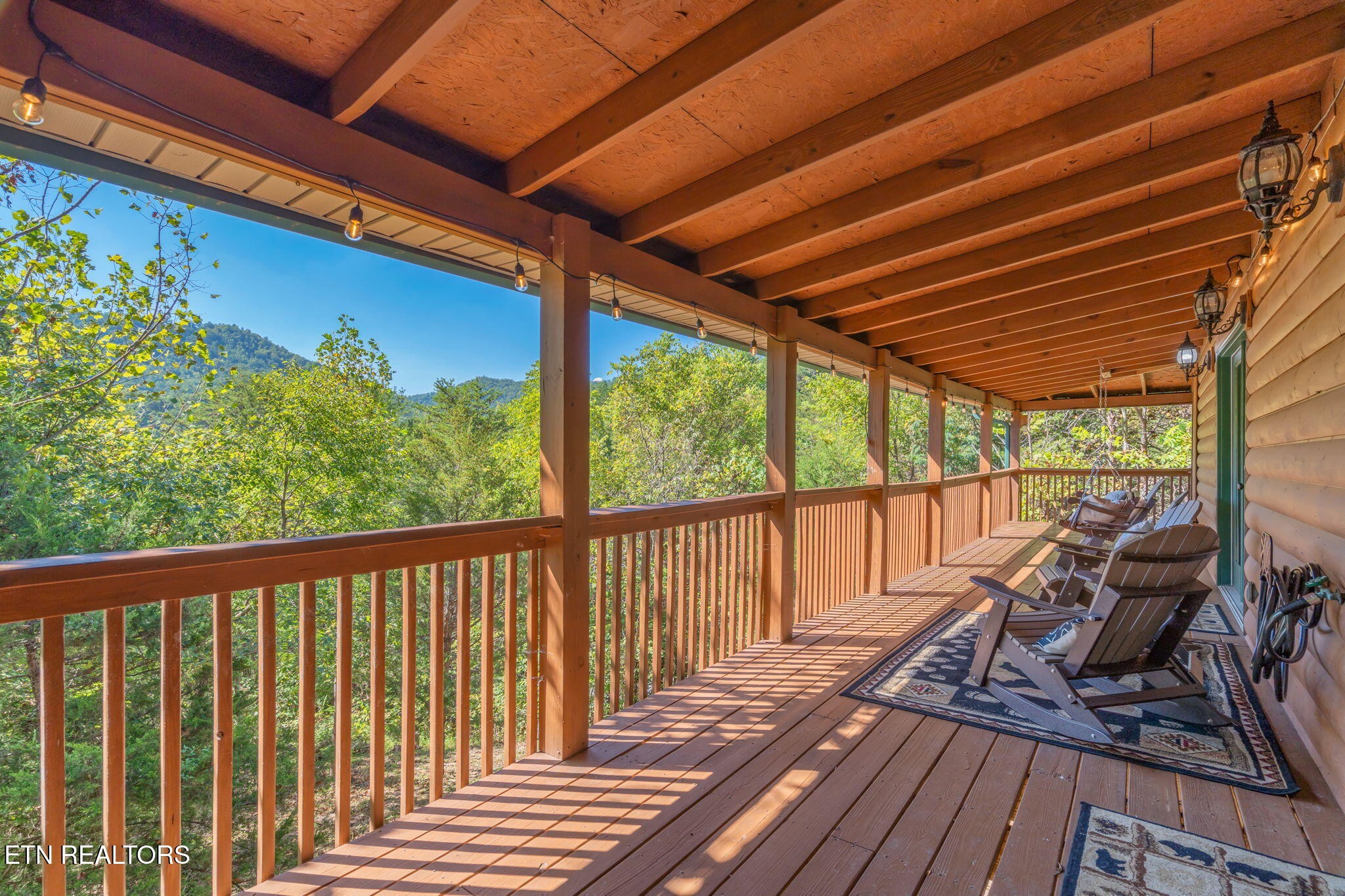 1723 Springer Road Sevierville, TN 37862 - Photo 5 of 43 a view of balcony with wooden floor