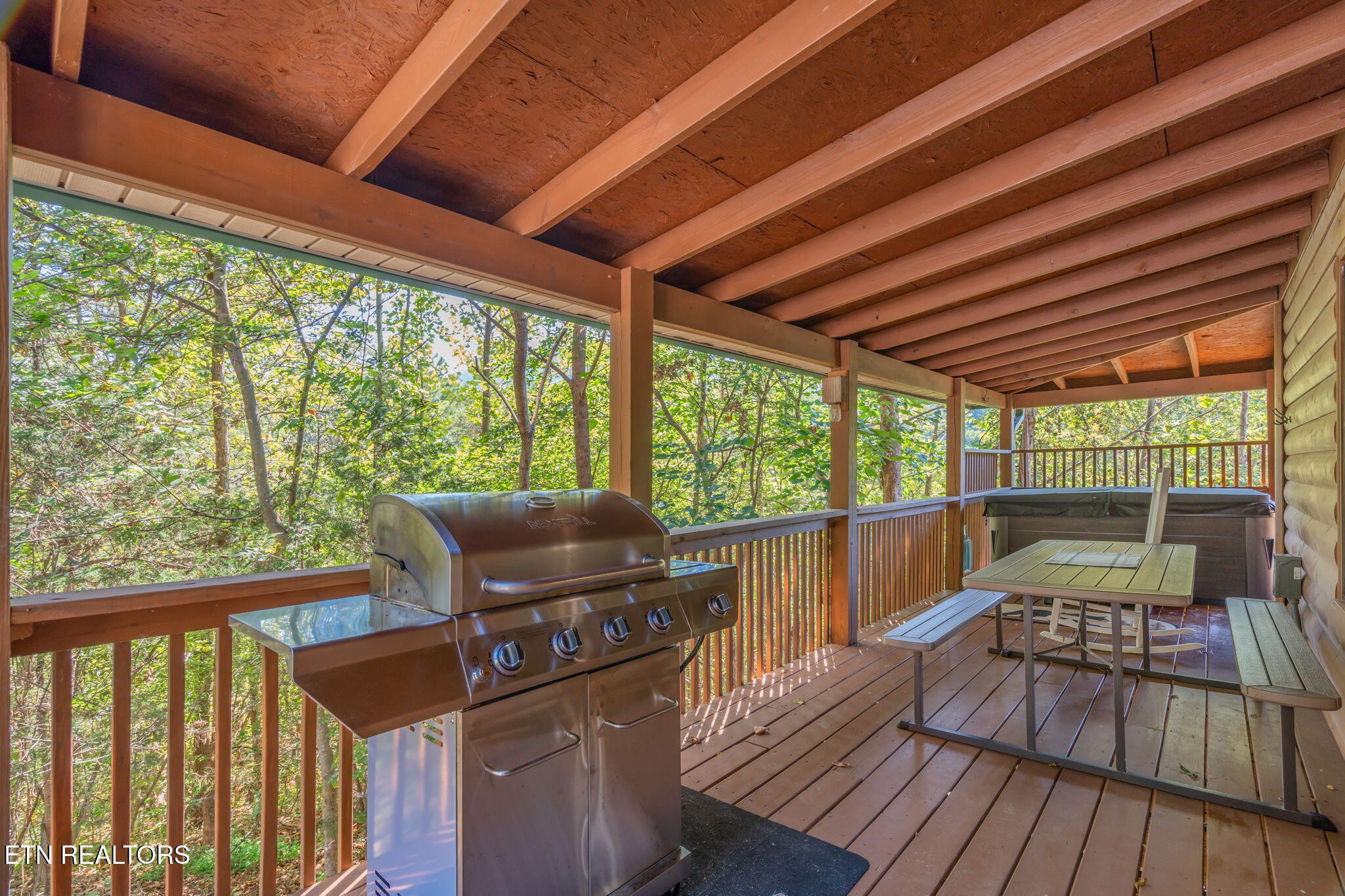 1723 Springer Road Sevierville, TN 37862 - Photo 8 of 43 a roof deck with wooden floor and outdoor space