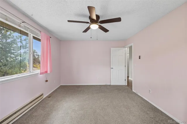 a fire hydrant in the middle of a field