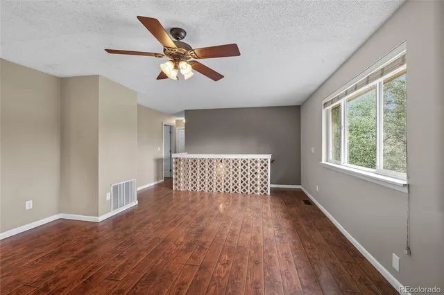 an aerial view of a house with outdoor space