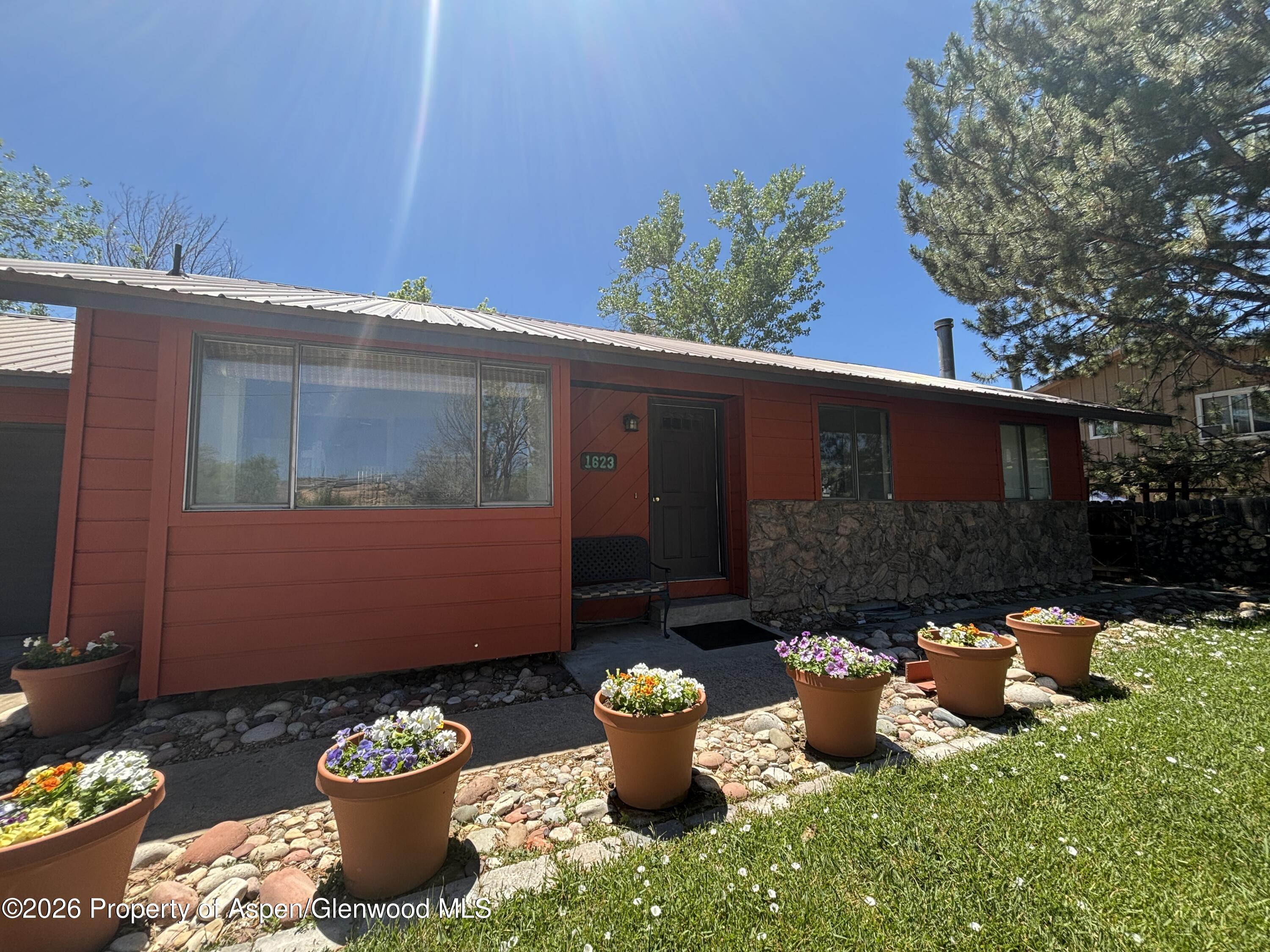 1623 West 7th Street Rifle, CO 81650 - Photo 20 of 21 a front view of a house with patio