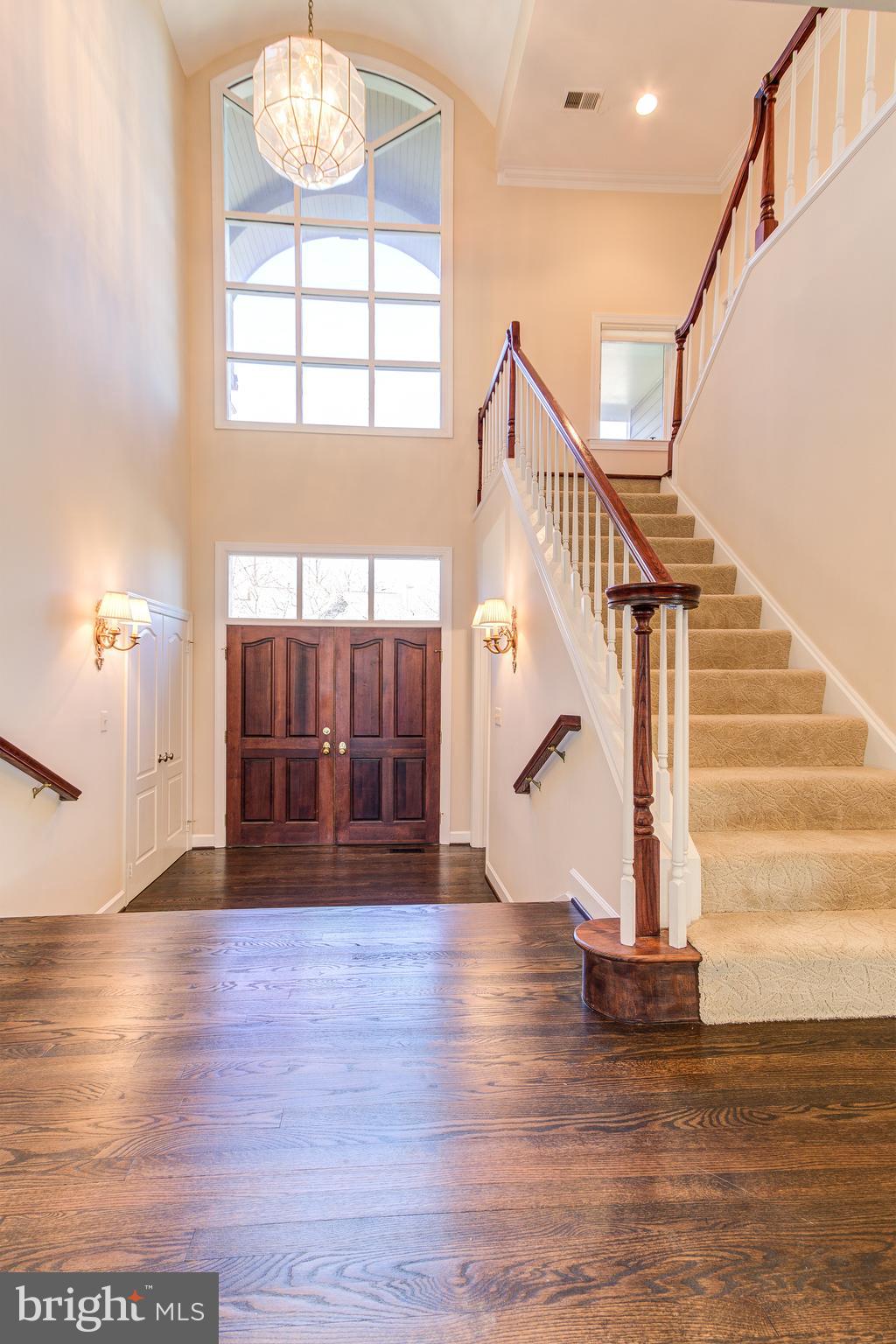 1305 Stamford Way Reston, VA 20194 - Photo 4 of 47 Dramatic windows are a hallmark of this home