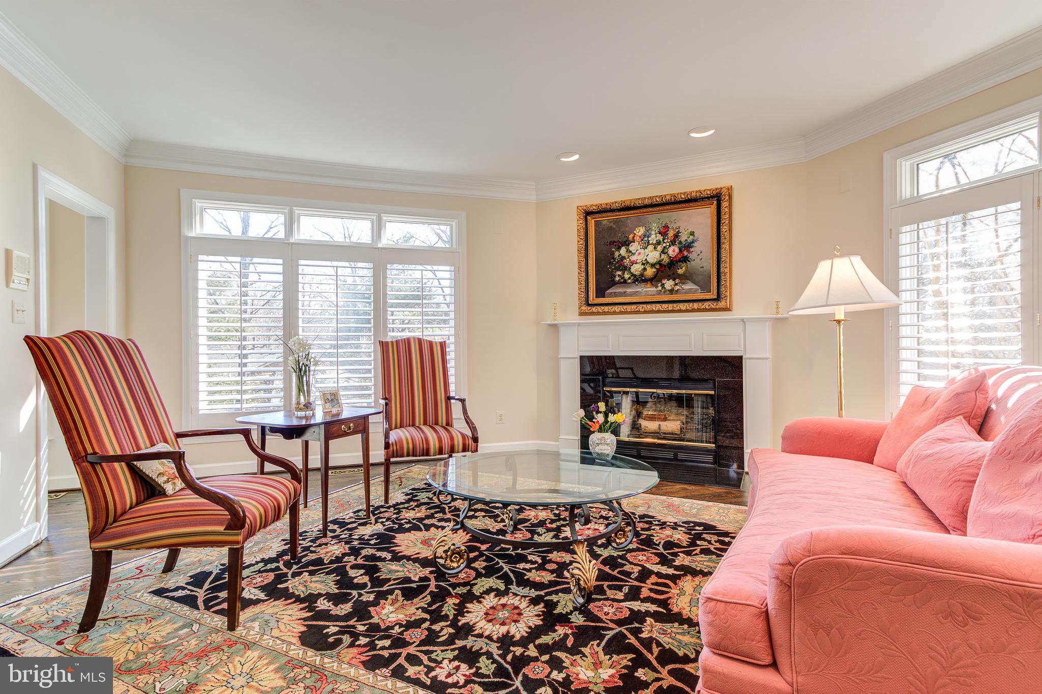1305 Stamford Way Reston, VA 20194 - Photo 5 of 47 Transom windows and cozy fireplace in the LR