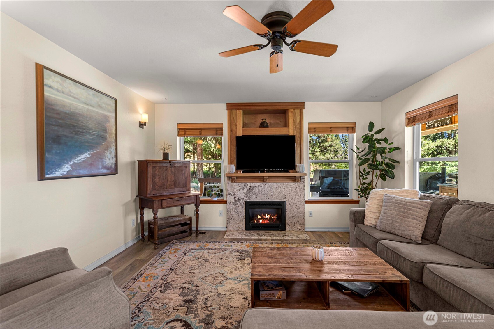 17558 River Road Leavenworth, WA 98826 - Photo 12 of 35 a living room with furniture and a flat screen tv