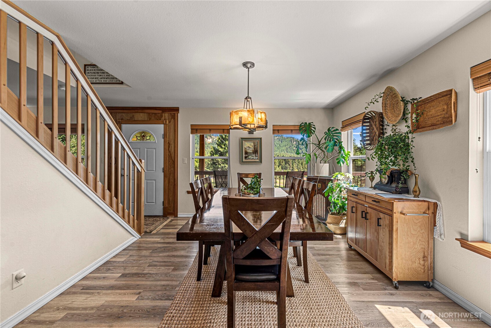 17558 River Road Leavenworth, WA 98826 - Photo 16 of 35 a dining room with furniture window and wooden floor